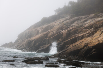 Ocean waves meeting a rocky shore