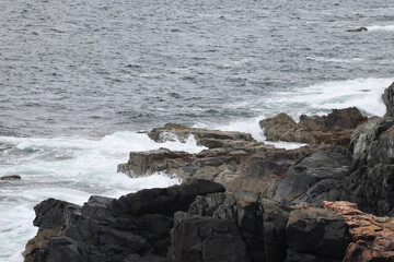 Ocean waves  crashing on a rocky shore