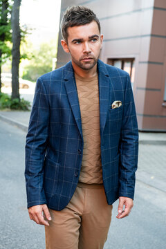 Young man posing in trendy autumn clothes
