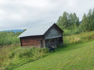 Fototapeta na wymiar Small log cabin, wooden house in Kvikkokk at northern Sweden Lapland