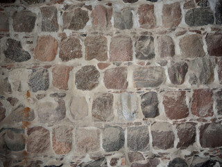 old brick wall.  big stones in the wall . front view. poster