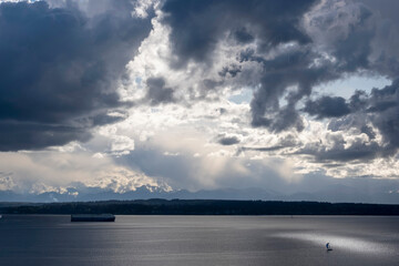 Cargo ship and sailboat on Puget Sound