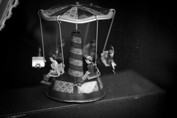 Monochrome shot of a vintage carousel toy