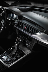 Fototapeta na wymiar Close-up of air vent in car. Dashboard in modern car interior.
