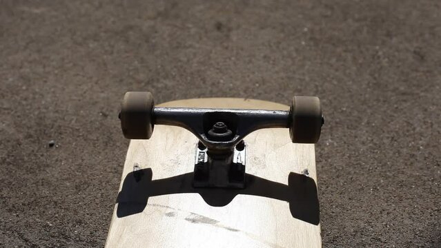 Skateboard Wheels Rolling Mid Afternoon Sunlight Outdoor Lighting