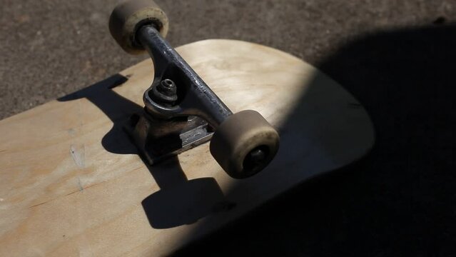 Skateboard Wheels Rolling Mid Afternoon Sunlight Outdoor Lighting