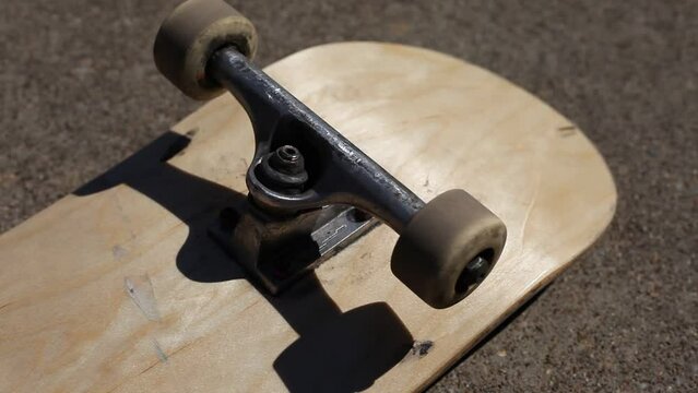 Skateboard Wheels Rolling Mid Afternoon Sunlight Outdoor Lighting