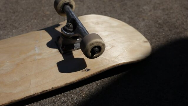 Skateboard Wheels Rolling Mid Afternoon Sunlight Outdoor Lighting