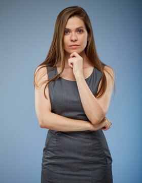Serious successful business woman in office dress isolated portrait.