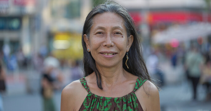 Mature Asian Woman Smile Happy Face Portrait On City Street