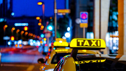 Taxi Cabs In The City At Night