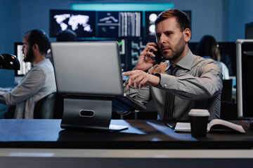 Business man working with computer, planning and analyzing graph stock market trading with stock chart data, business financial investment and technology concept