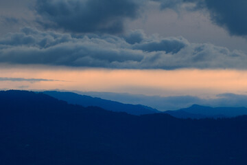 Fototapeta premium Blue and orange peaceful and serene cloudy sunset near the beautiful colonial city of Villa de Leyva in Colombia.