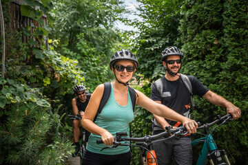 woman and man caucasian friends ride electric bicycle e-bike in summer
