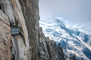 Windows of the viewpoint of Aiguille du Midi in Montblanc, with views of the snowy mountain.