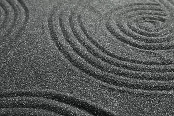 Fototapeten Pattern on decorative black sand, closeup. Zen and harmony © New Africa
