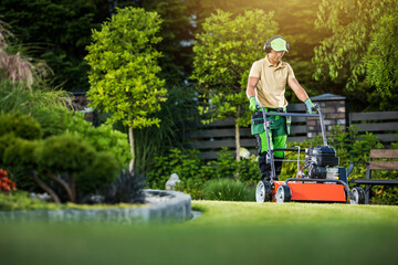 Gardener Mowing the Lawn