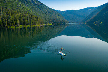 Drone shots of an emerald green lake