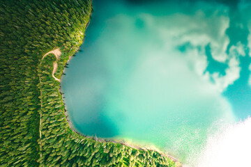 Drone shots of an emerald green lake