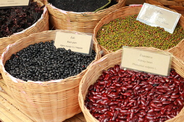 black green and red beans in the market