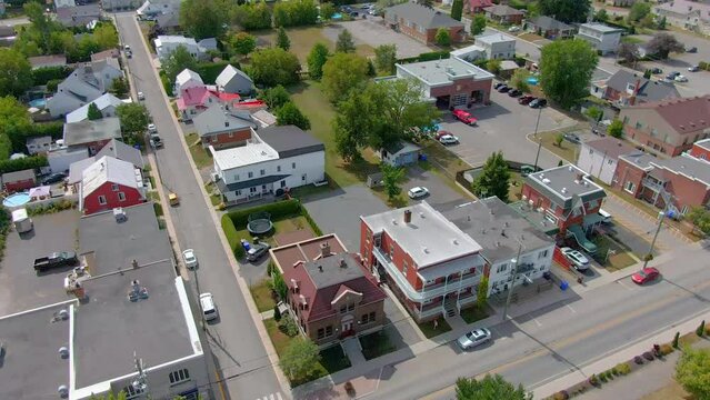 Aerial drone view looking down and showing the postal office of the small village of St-Jacques