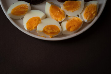 Sandwiches with red fish and boiled egg.