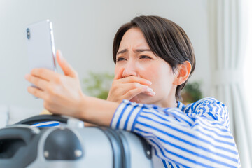 携帯を持ちトラブルを抱えた日本人女性