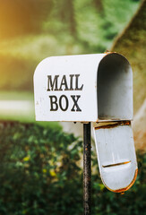 Mail Box in the autumn village. Old Mail Box In Sunset.