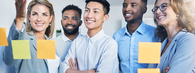 Happy marketing and advertising team planning with post it note on glass in an office. Business people meeting, coaching and collaboration with idea and vision for company target, goal and motivation