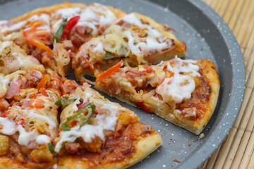 Delicious home made pizza with extra cheese.