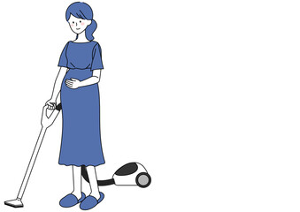 掃除機をかける妊婦