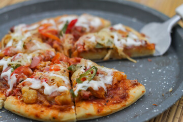 Delicious home made pizza with extra cheese.