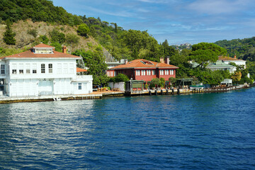 Fototapeta na wymiar Views of various houses, (home) mansions and nostalgic buildings from the sea on the Bosphorus, on the Asia side of Istanbul. residence by the sea.