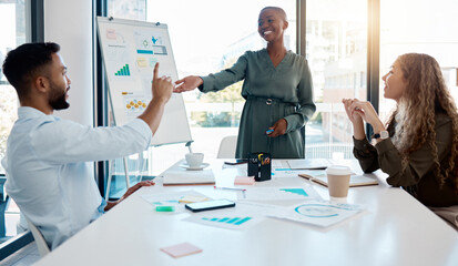 Manager training team of business people in office corporate meeting. Black female marketing leader talk in a workshop presentation, education seminar and conference with diverse group of colleagues