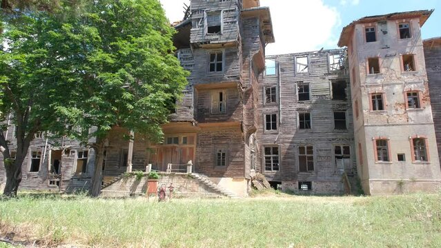 4k Video of biggest wooden made abandoned and brownfield building of Orphanage local name is Rum Yetimhanesi in Buyukada istanbul