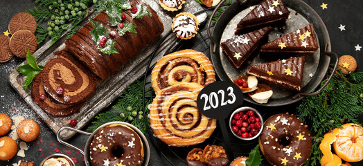 Traditional Christmas dessert on dark background.