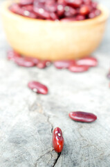 Sigle close up of Red bean seeds on vintage wooden table backgrounds