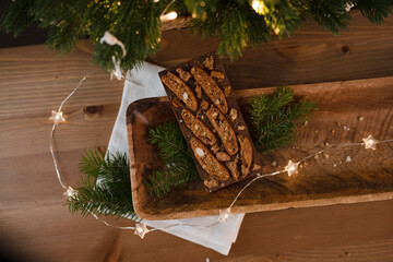 Handmade chocolate on a wooden tray