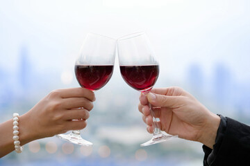 Couple celebrating valentine's day By drinking red wine Valentine Day Festival Ideas