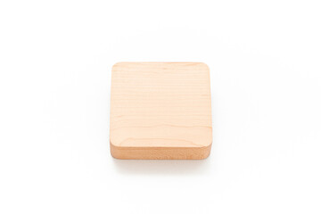 Wooden block isolated on white background. Object. Simplicity. Timber. Wooden surface. Material. 
