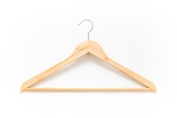 Clothes hanger isolated on white background. Wooden clothes hanger. Wood surface. Scandinavian design. Household item. Home decoration. Daily use. Simplicity. 