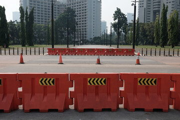 roadblock and traffic cone on the street