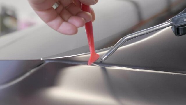 Heat Gun and Plastic Tool Used For Car Wrapping with Vinyl Foil FOLLOW
