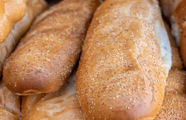 Freshly baked sesame white bread for sale at the farmers market