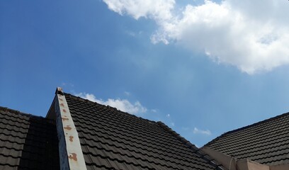 Fototapeta na wymiar roof with bright sky background