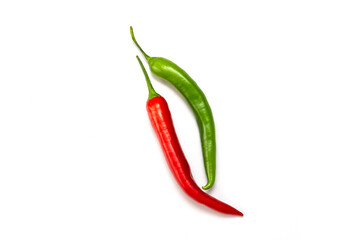 two hot peppers, red and green  isolated
