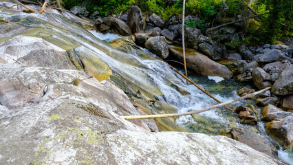 Slovak mountain river in the High Tatras. Tourist trails in the summer along the clear, fast river Studena. © Sandris Veveris