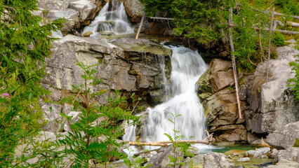 Waterfalls at stream Studeny potok in High Tatras mountains during summer, Slovakia