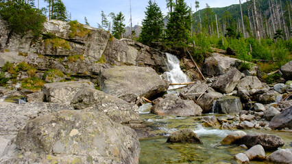 Waterfalls at stream Studeny potok in High Tatras mountains during summer, Slovakia
