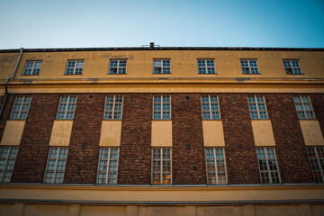 Old worn building exterior with bricks